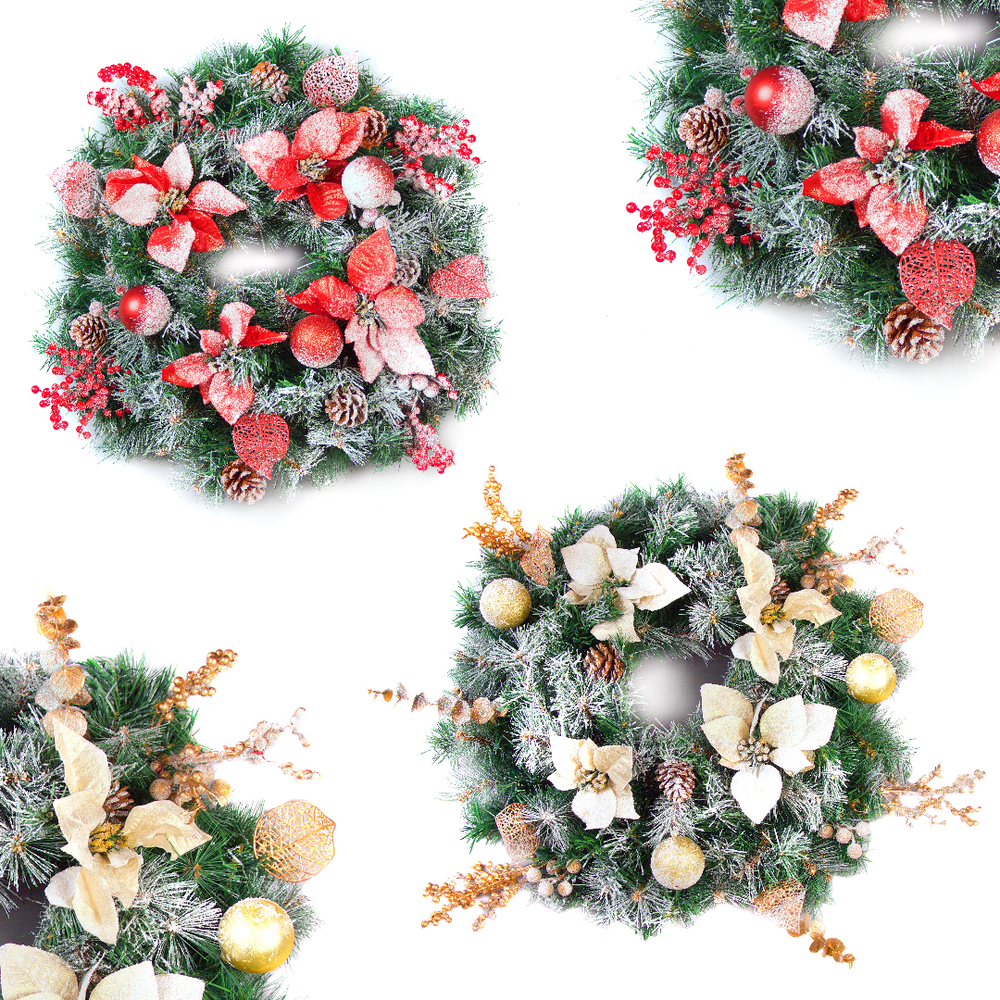 A collection of artificial Christmas wreaths with frosted cream and gold decorations, including pinecones and red berries.