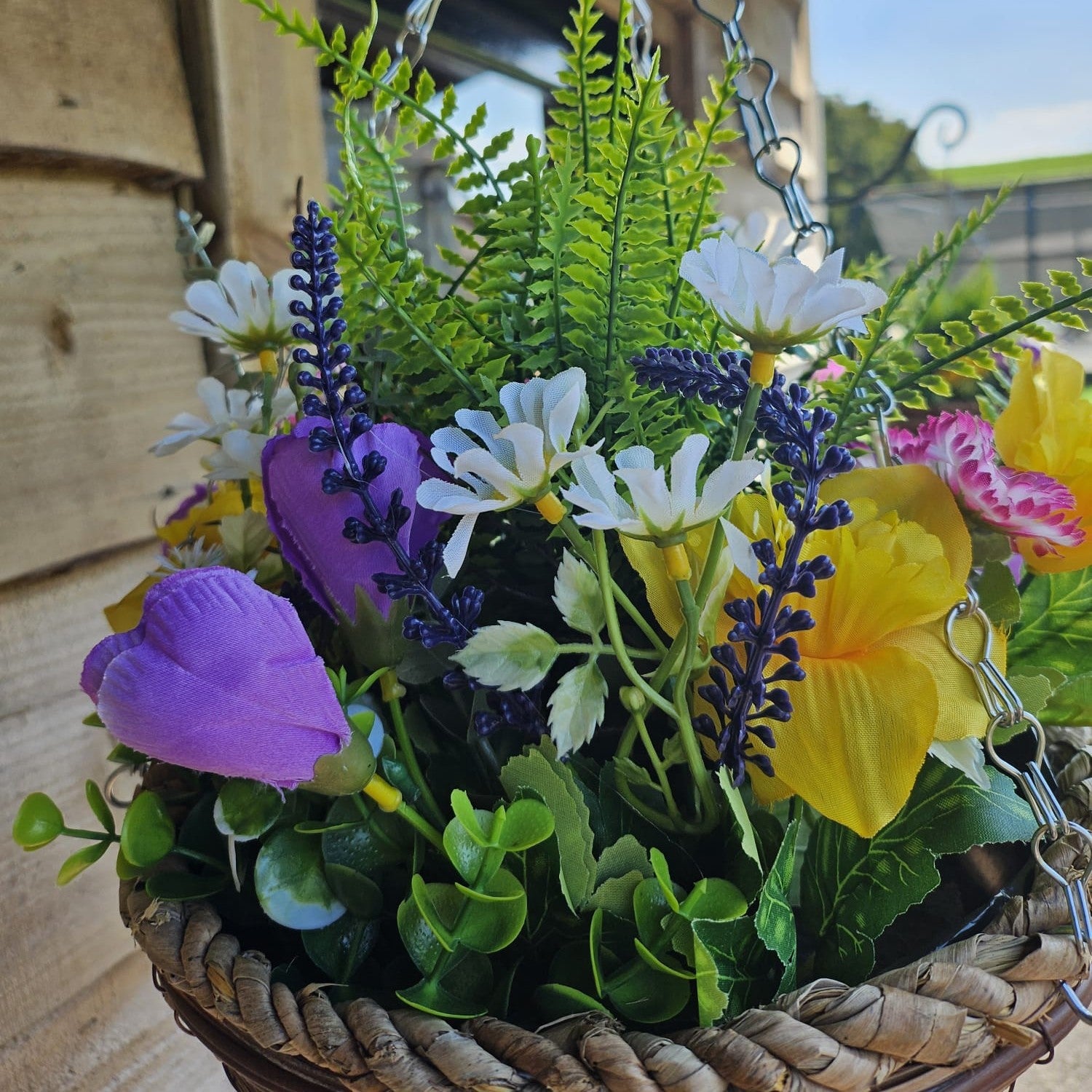 Pair Of Best Artificial Yellow Mixed Meadow Flower Displays in 10 Inch Woven Decorative Hanging Baskets (Fern Centre)