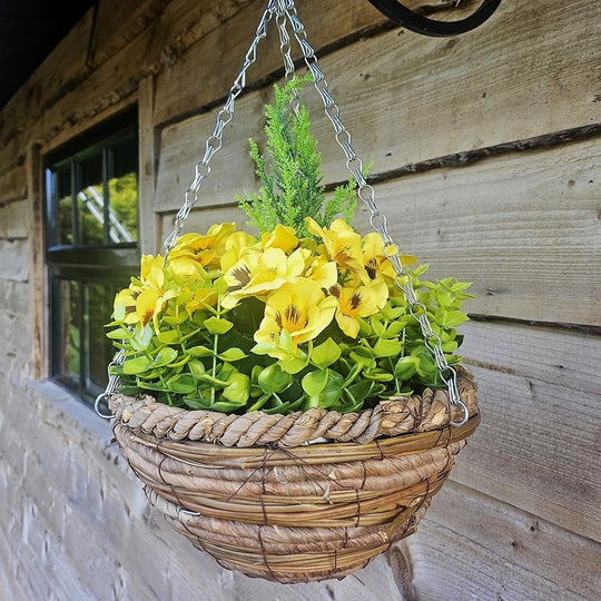 Pair of Best Artificial 10 Inch Yellow Pansy Spring Hanging Baskets with Greenery and Conifer Centre
