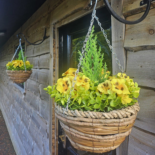 Pair of Best Artificial 10 Inch Yellow Pansy Spring Hanging Baskets with Greenery and Conifer Centre