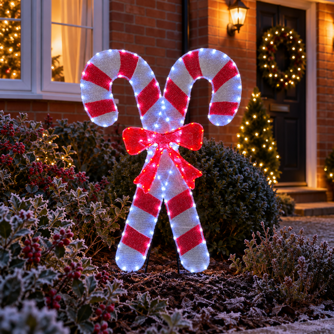 Best Artificial Illuminated Christmas Candy Cane Motif in a UK Christmas lifestyle setting
