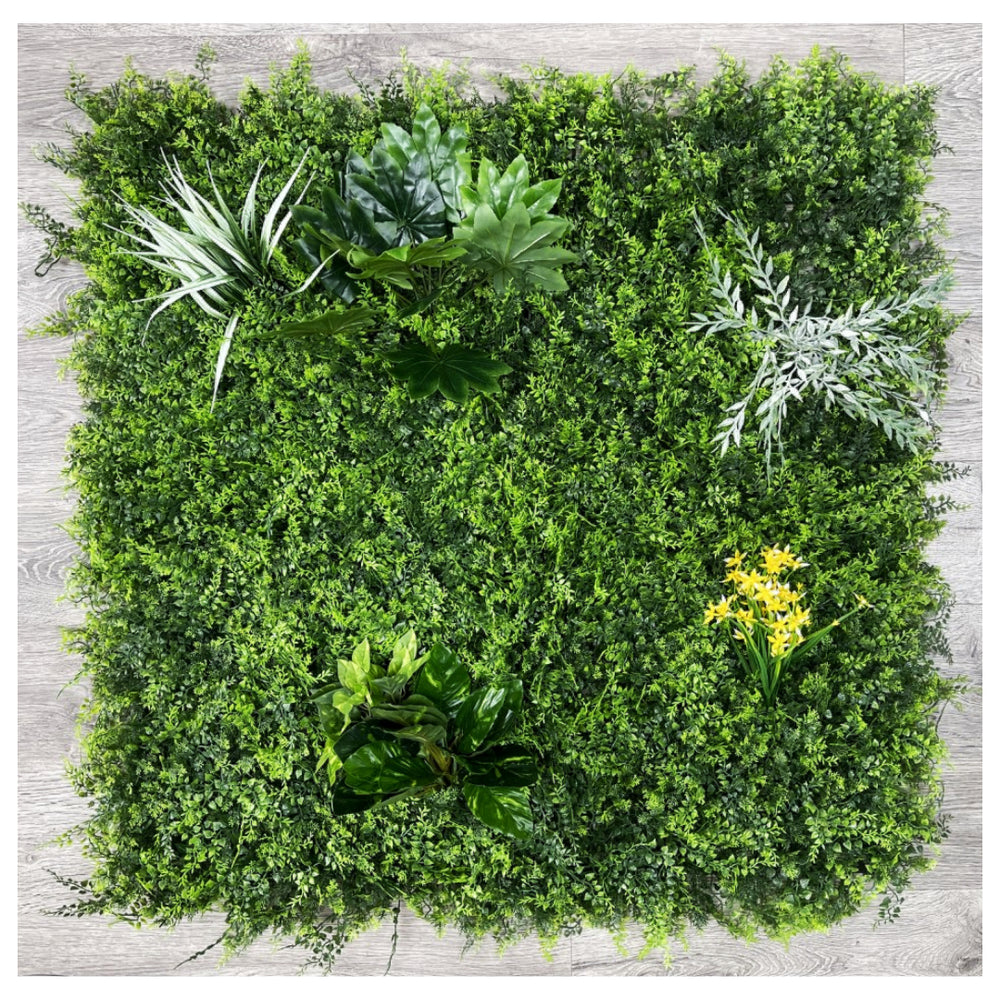 A 1m x 1m artificial green living wall mat with various artificial plants and foliage designed for both indoor and outdoor use.